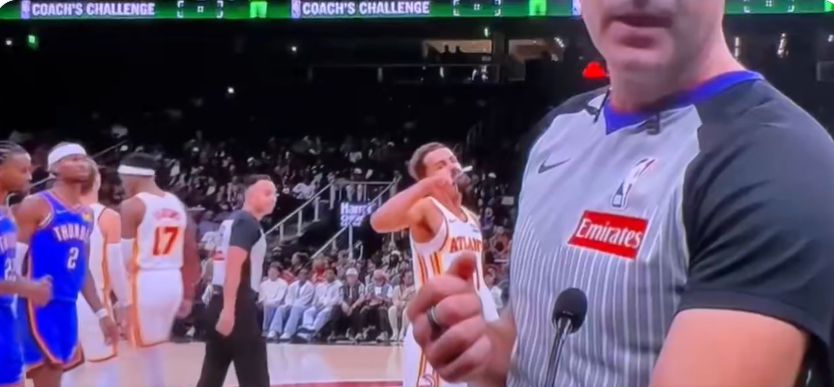 Not afraid of fines? Trae Young made a thumbs down gesture behind the referee to express dissatisfaction