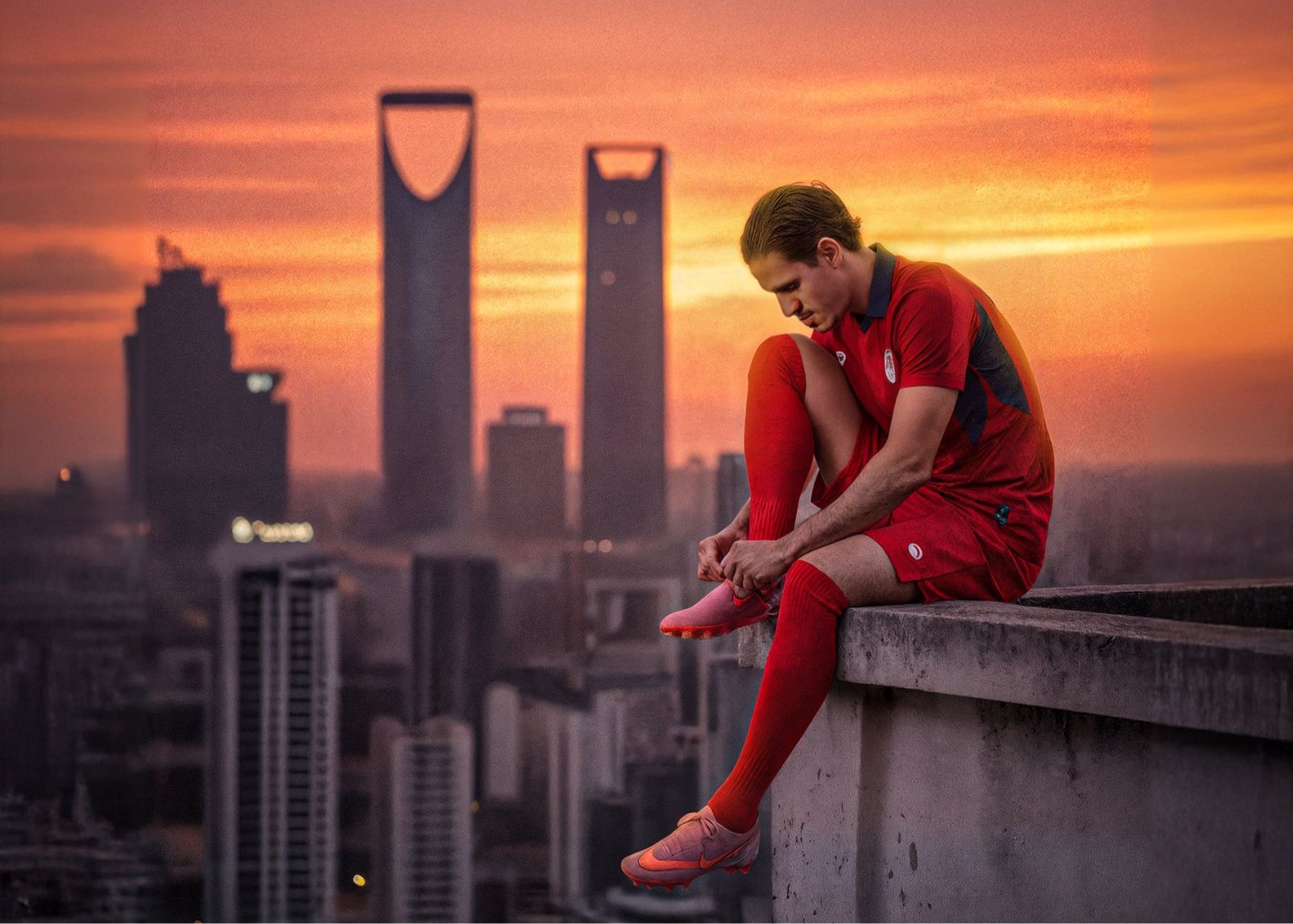 Realistic portrayal or abstraction? DAMAC official poster: Players sit on the edge of the rooftop to tie their shoelaces