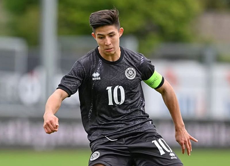 The teenager who was booked by Chelsea scored against Belgium and became the youngest scorer in the World European Preliminaries in 60 years.